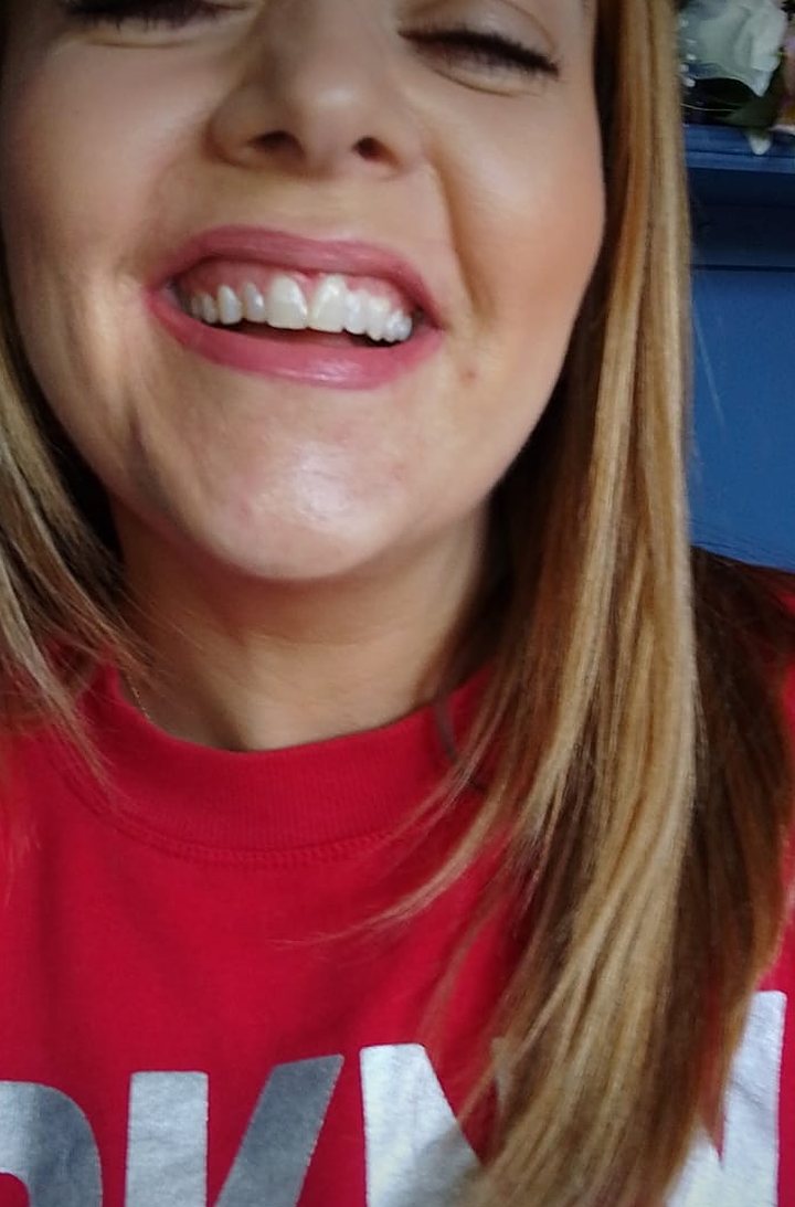 Smiling Lumiere client after teeth whitening at the Kildare studio
