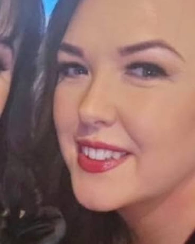 A smiling Lumiere teeth whitening client in Kildare.