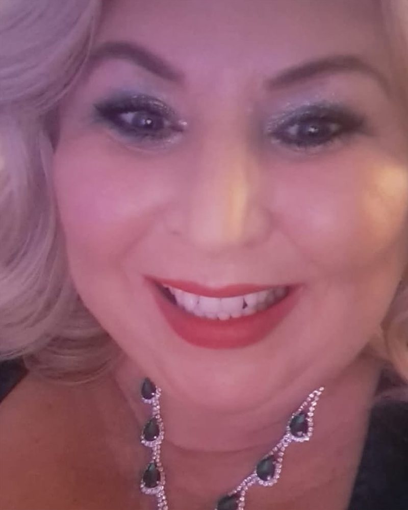 A smiling Lumiere teeth whitening client in Kildare.